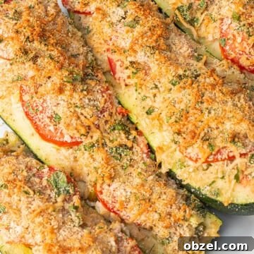 Baked Cheesy Zucchini Tuna Melts 7 Zucchini Tuna Melts with tomatoes and parmesan cheese