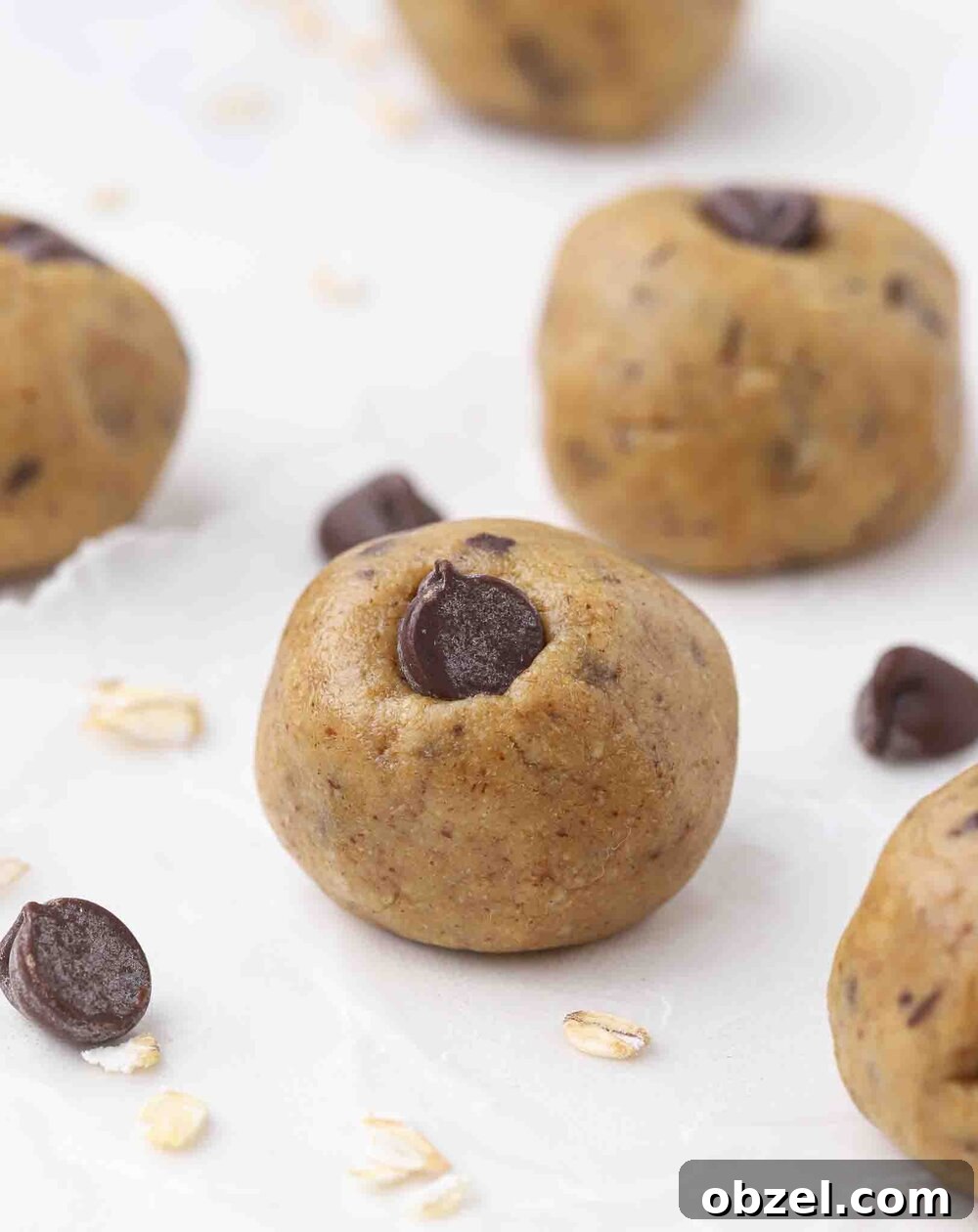 Cookie dough balls on a table.