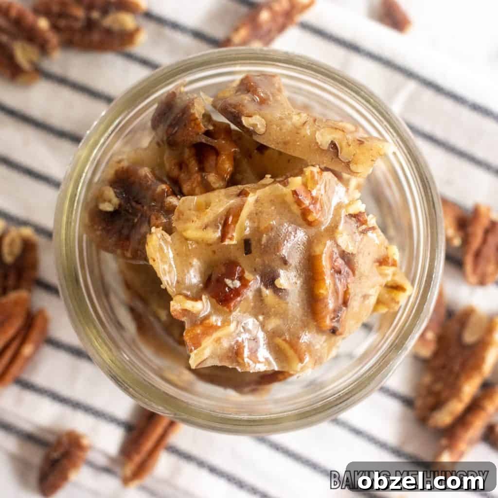 Old Fashioned Pecan Brittle Recipe 11 old fashioned pecan brittle in glass jar on striped napkin from overhead