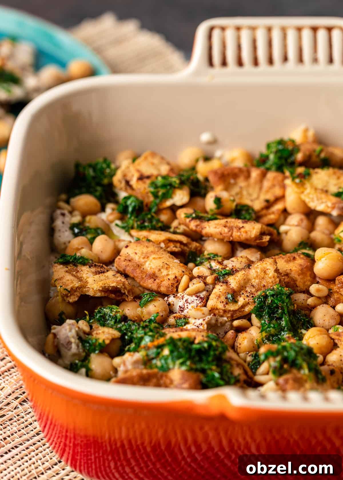 Fatteh with Crispy Pita Hummus and Yogurt 10 fattet hummus in square red dish