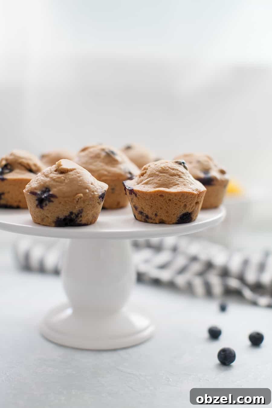 Zesty Lemon Blueberry Muffins Recipe 6 Stack of muffins