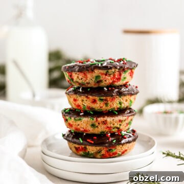 Festive Christmas Donuts for Holiday Baking 11 Christmas donuts with chocolate ganache and sprinkles