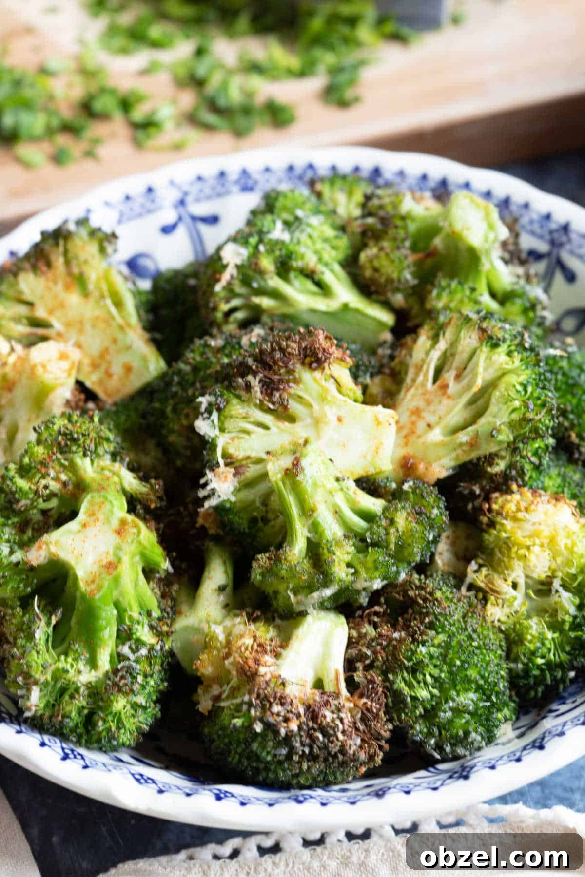 Air fryer broccoli in a bowl with Parmesan.