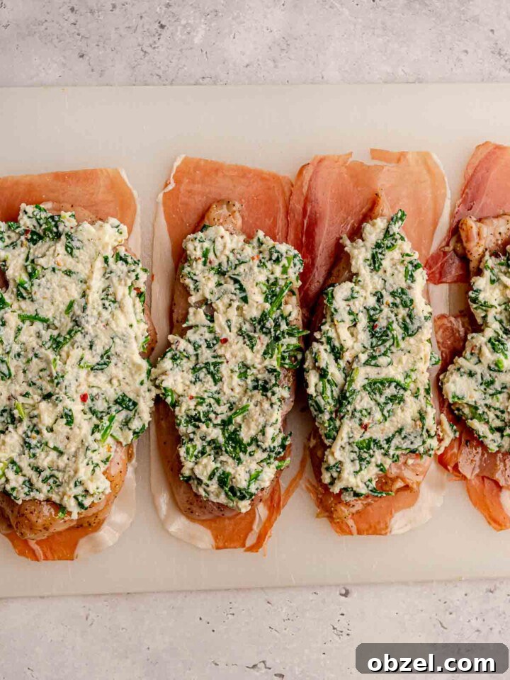 Ricotta cheese on top of chicken breasts.