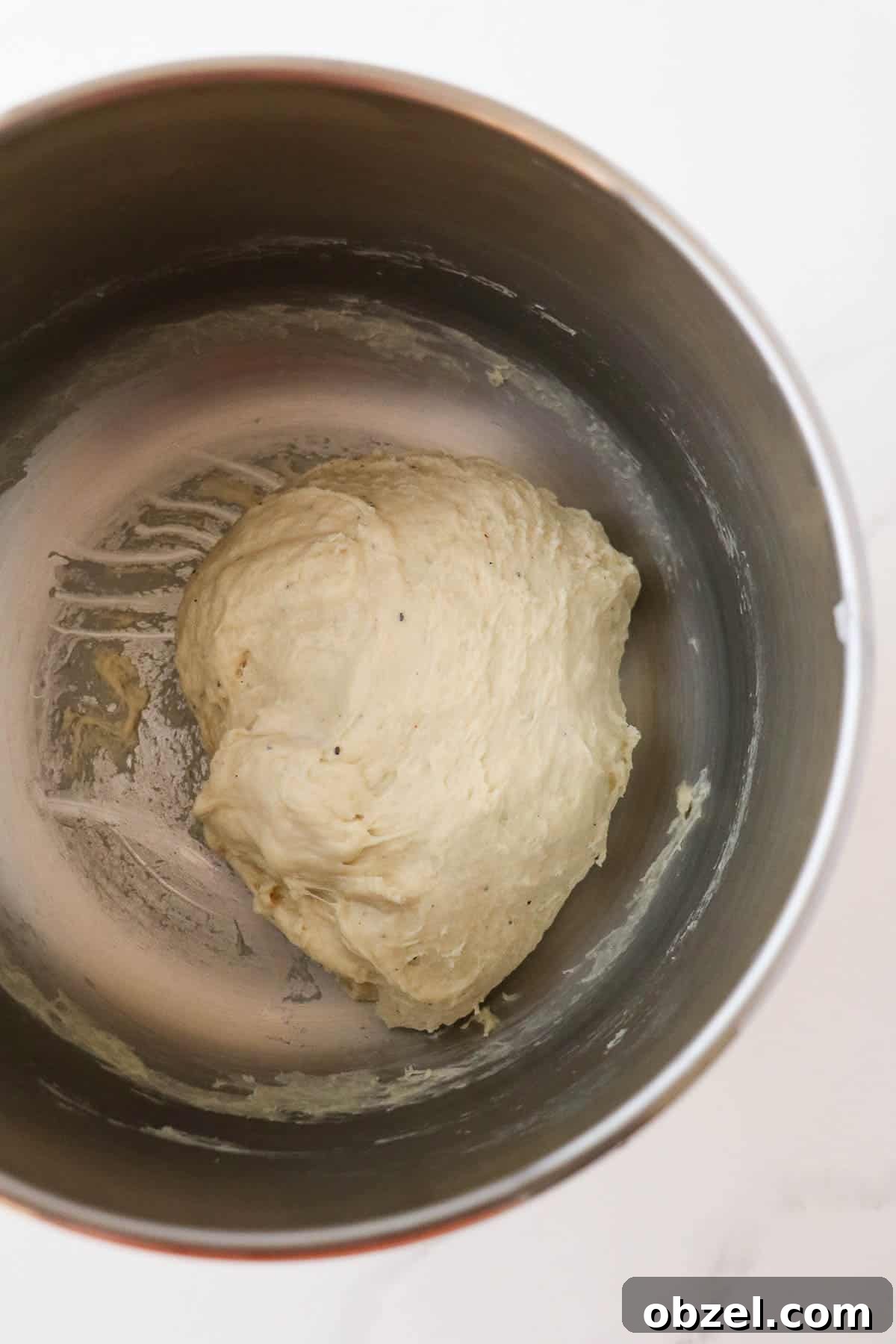 Fastelavnsboller: Norwegian Lenten Buns Recipe 5 Unrisen dough for Fastelavnsboller (Norwegian Lenten Buns) in a metal bowl.