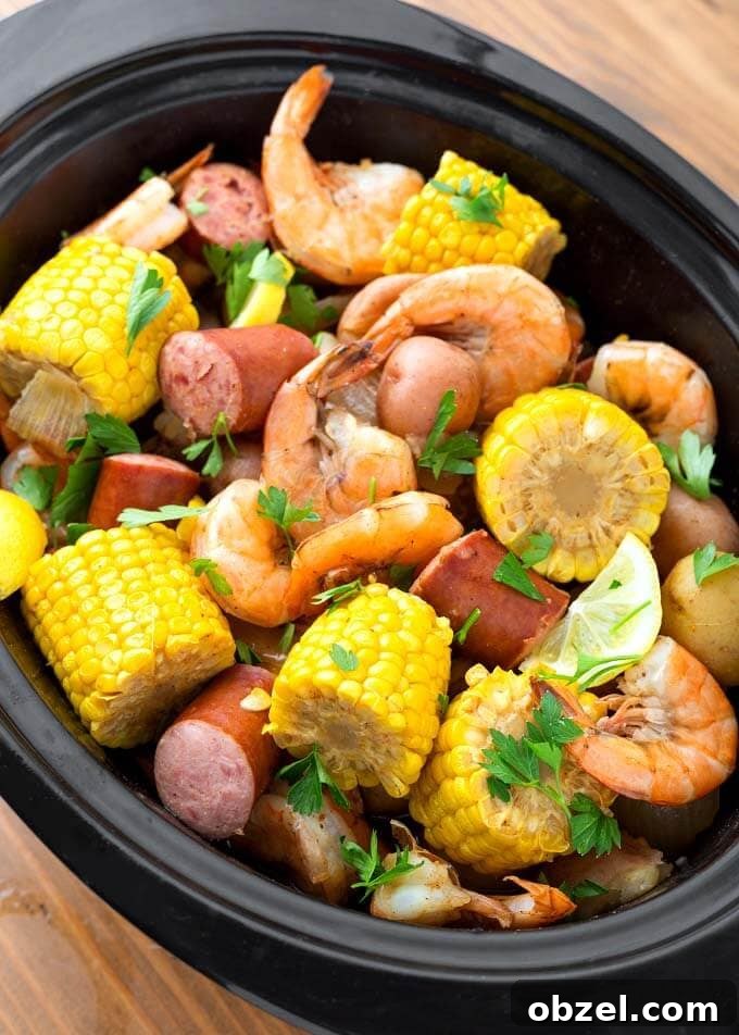Slow Cooker Shrimp Boil with Corn, Sausage and Potatoes 3 Close up of Shrimp Boil in Slow Cooker