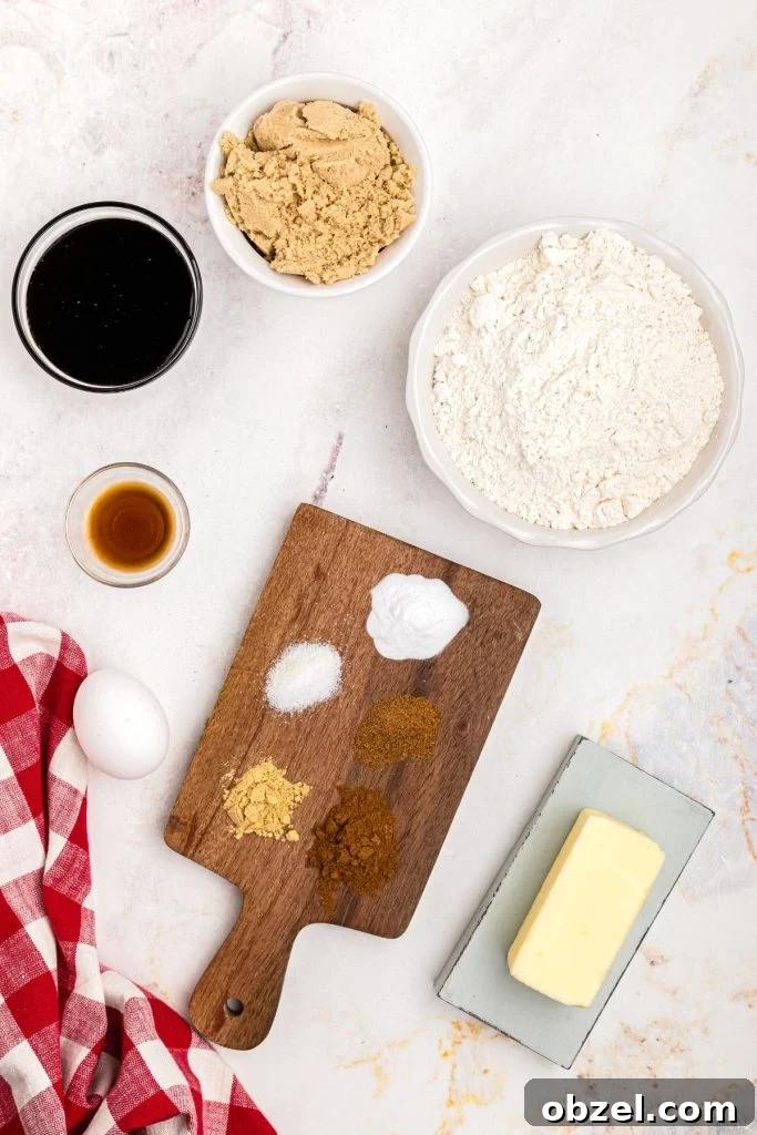 Air Fryer Gingerbread Cookies Recipe 4 Ingredients measured on the marble table with a red linen