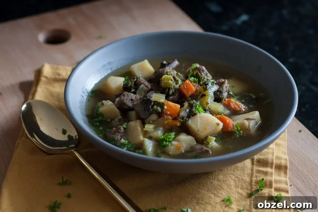 Stay warm when it's cold with nourishing food like this veggie packed winter kale beef soup recipe!