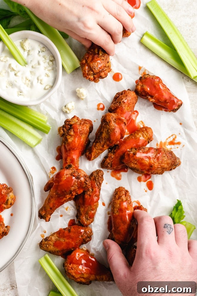 Crispy Baked Chicken Wings with Sauce Sauced crispy baked chicken wings