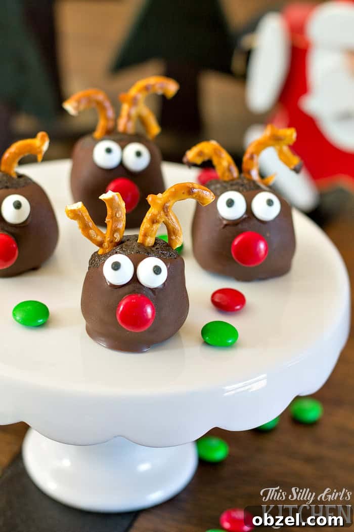 Rudolph Oreo Cookie Balls, fun and festive, made with mint Oreos for an extra holiday twist! from ThisSillyGirlsLife.com #oreocookieballs Rudolph Oreo Cookie Balls, fun and festive, made with mint Oreos for an extra holiday twist! from ThisSillyGirlsLife.com #oreocookieballs