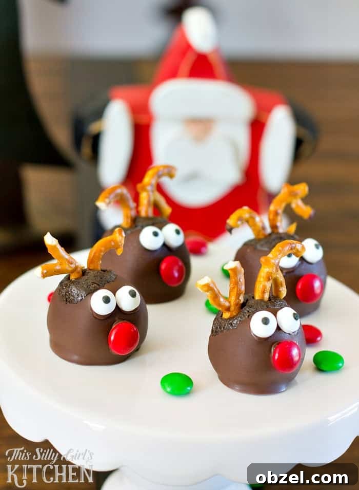 Rudolph Oreo Cookie Balls, fun and festive, made with mint Oreos for an extra holiday twist! from ThisSillyGirlsLife.com #oreocookieballs Rudolph Oreo Cookie Balls, fun and festive, made with mint Oreos for an extra holiday twist! from ThisSillyGirlsLife.com #oreocookieballs