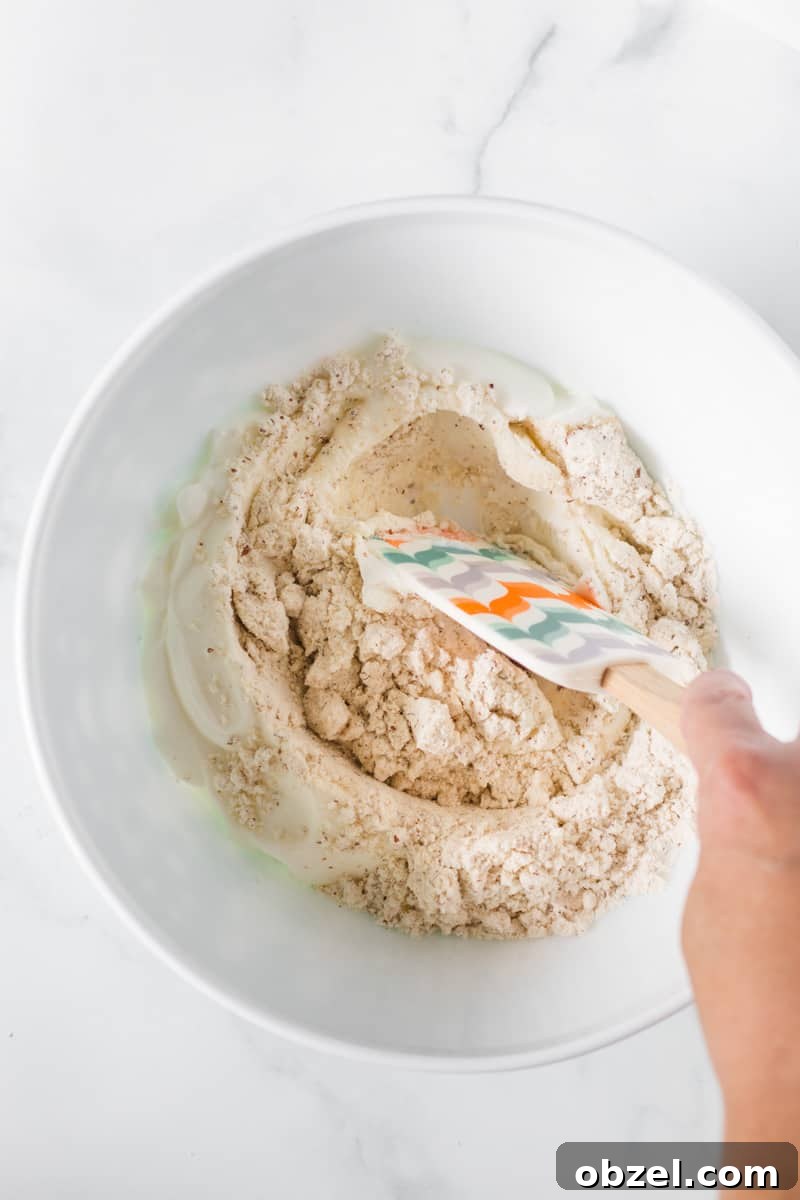 2-Ingredient Gluten-Free Bagels Recipe 4 Mixing greek yogurt and baking mix.
