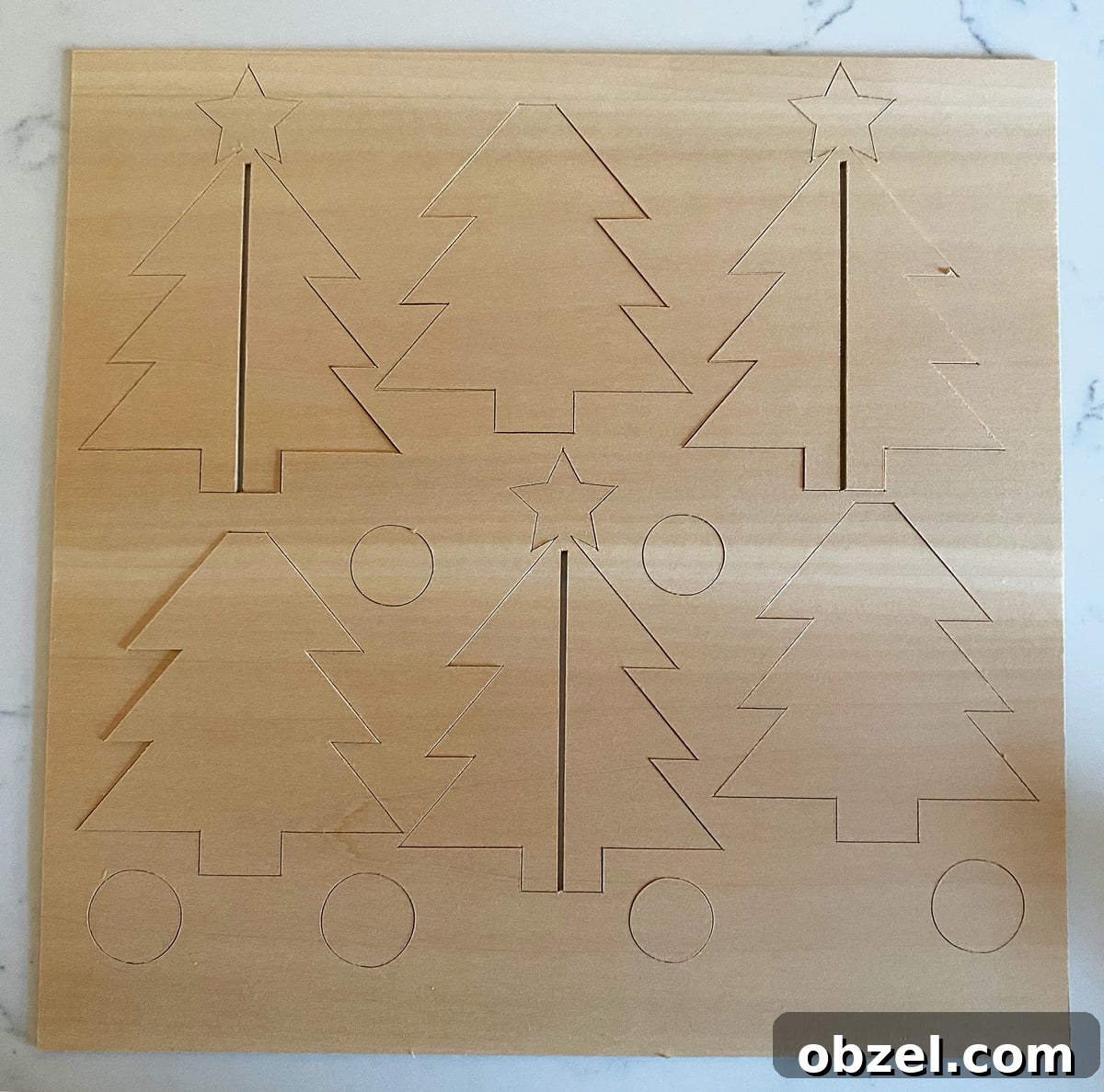 DIY 3D Wooden Christmas Tree with Cricut Maker 7 How to make a 3D wooden Christmas tree with your Cricut Maker and basswood.
