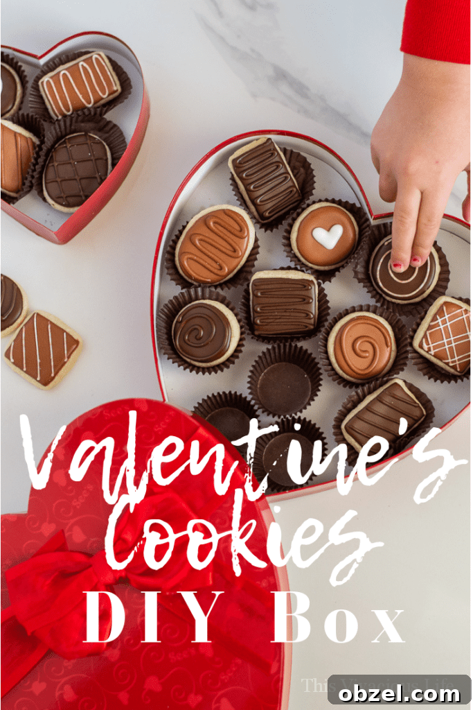 Valentine's Sugar Cookies: DIY Chocolate Box Gift 9 Valentine's Day sugar cookies in a DIY chocolate heart box are a fun gift to give a loved on. Can you only need THREE things to make this cute box?!