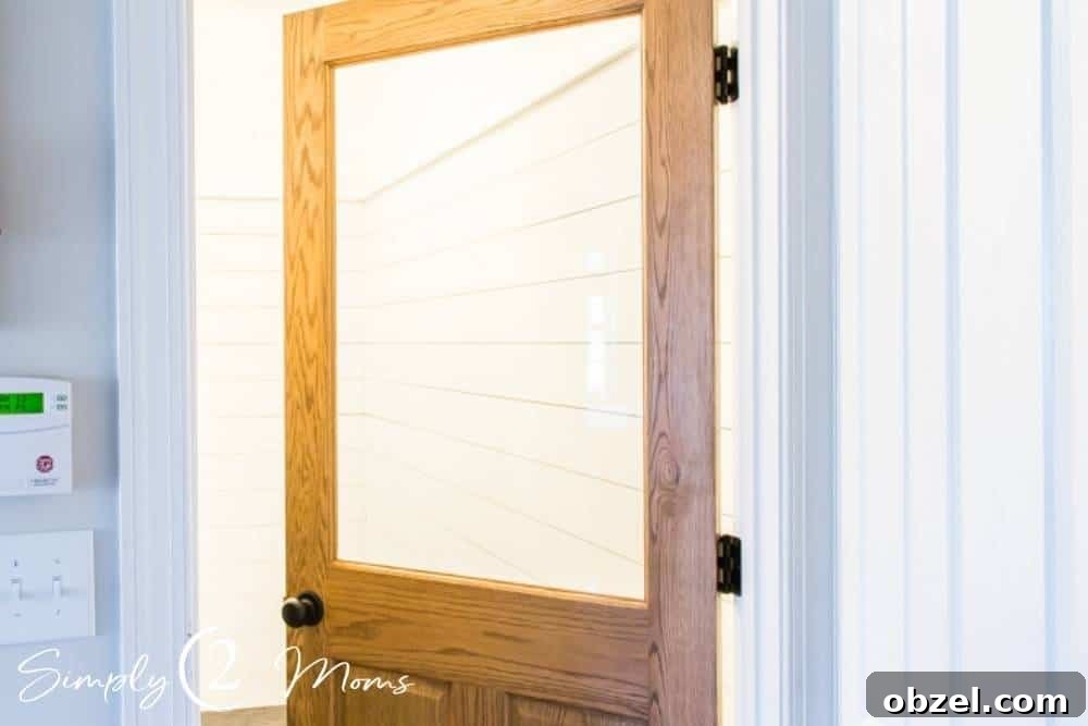 Stunning Before and After Laundry Room Makeover 29 custom wood door installation