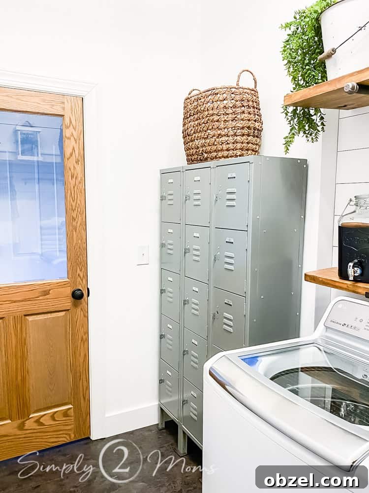 Stunning Before and After Laundry Room Makeover 7 view of stained wood and glass door from inside room with set of lockers on right side of room with basket above