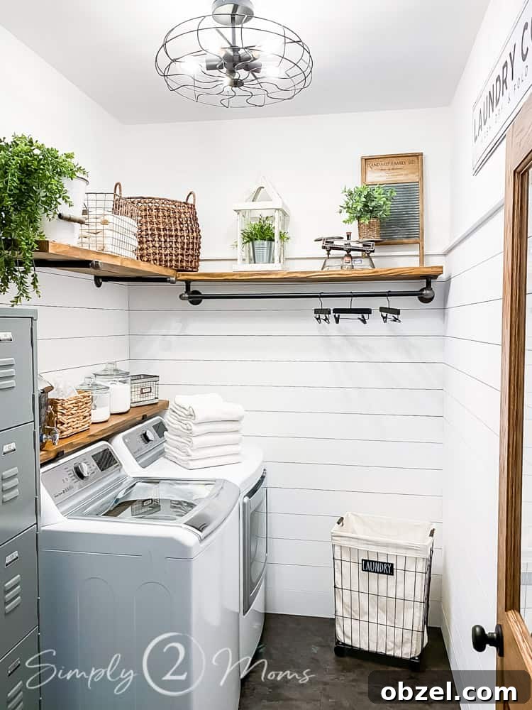 Stunning Before and After Laundry Room Makeover 9 laundry room transformation with shiplap walls diy wood shelving and plumping pipe hanging rod industrial lighting from ceiling lockers and appliance on left side of room