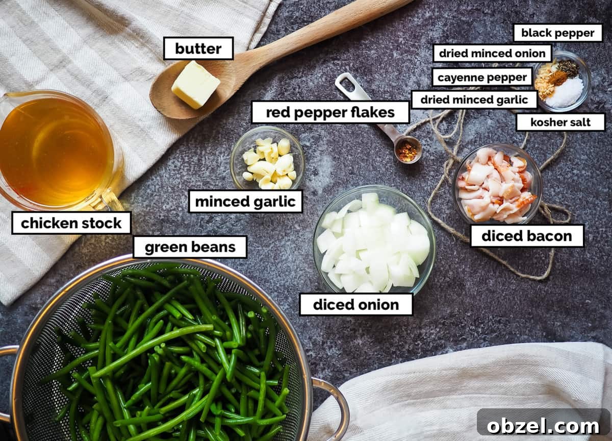 A picture of the ingredients of southern green beans on a gray background, labeled.