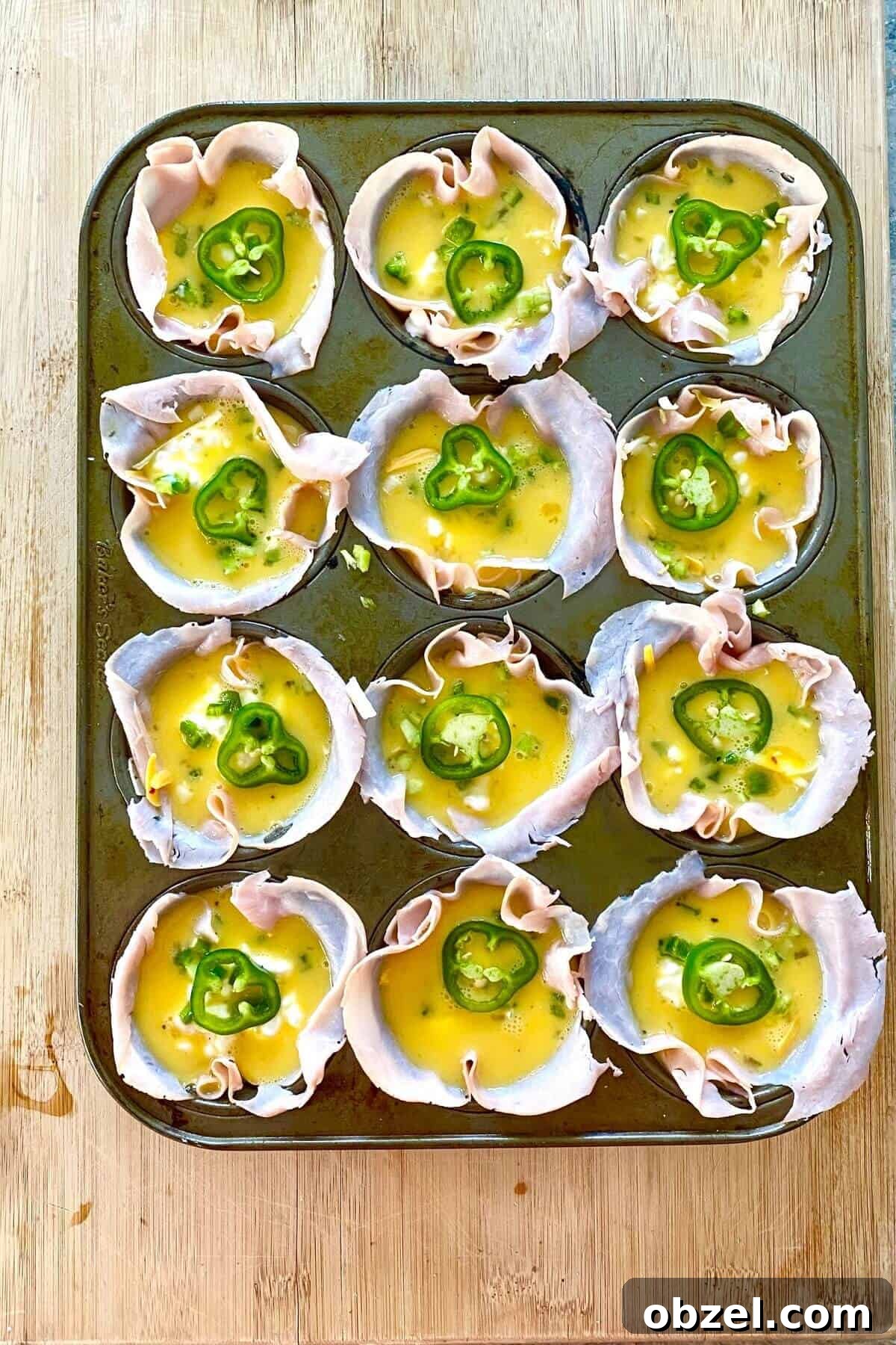 Spicy Jalapeno Popper Egg Cups Recipe 7 jalapeno egg cups unbaked.