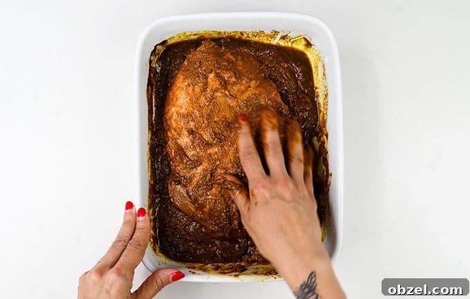 Marinated BBQ Boneless Leg of Lamb Recipe 7 Rubbing boneless leg of lamb with BBQ marinade