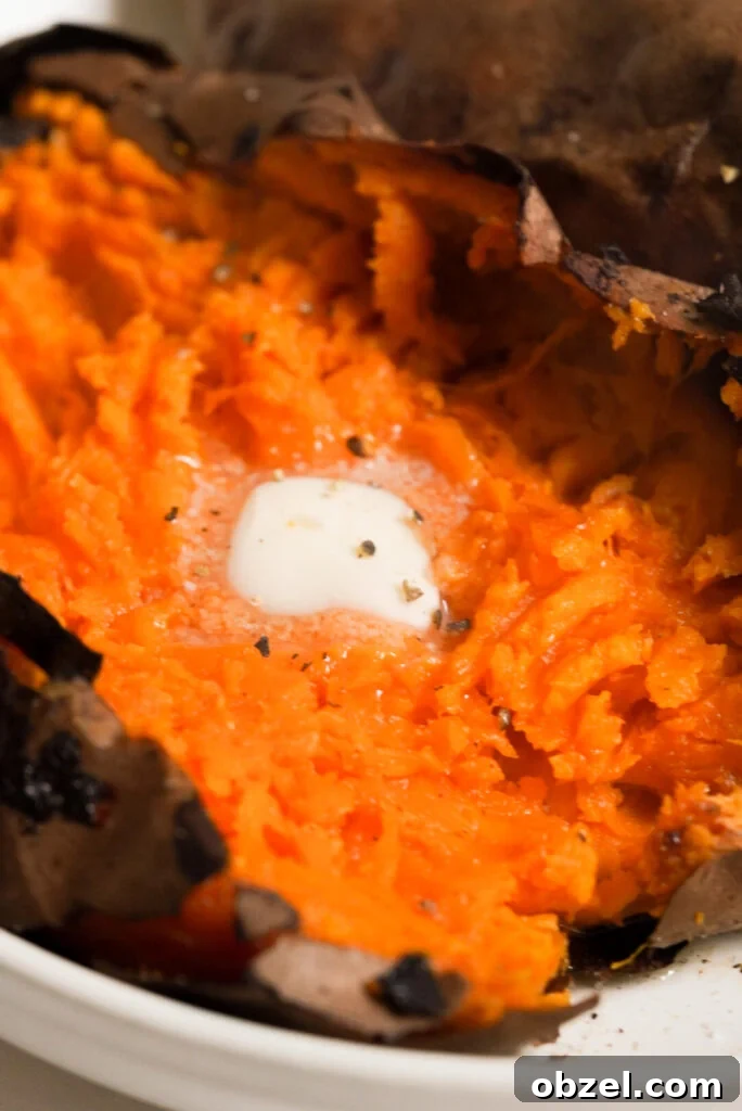 Air Fryer Baked Sweet Potato with Crispy Skin 11 close up shot of a sweet potato made in the air fryer