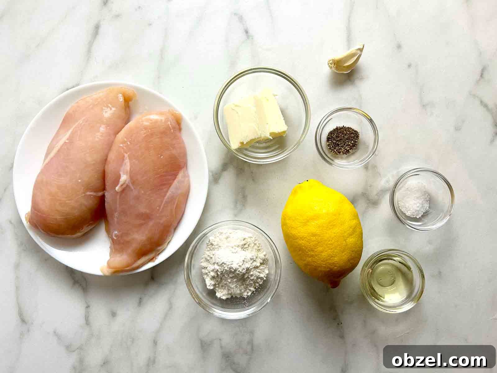 Juicy Lemon Pepper Chicken Breasts Recipe 3 all required ingredients prepped in bowls.