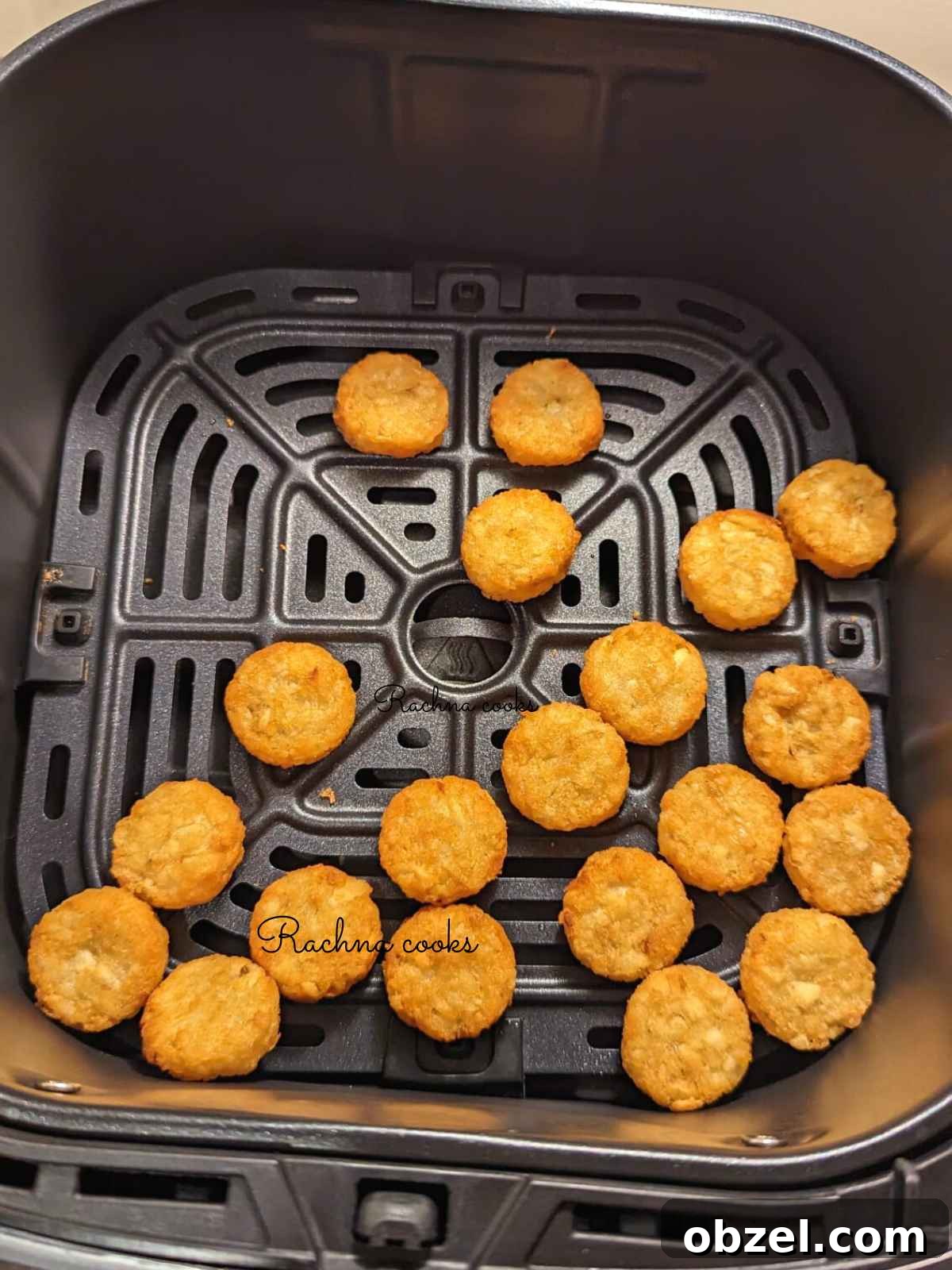Air Fryer Ore-Ida Crispy Crowns Recipe 3 Crispy Ore Ida crispy crowns in air fryer basket