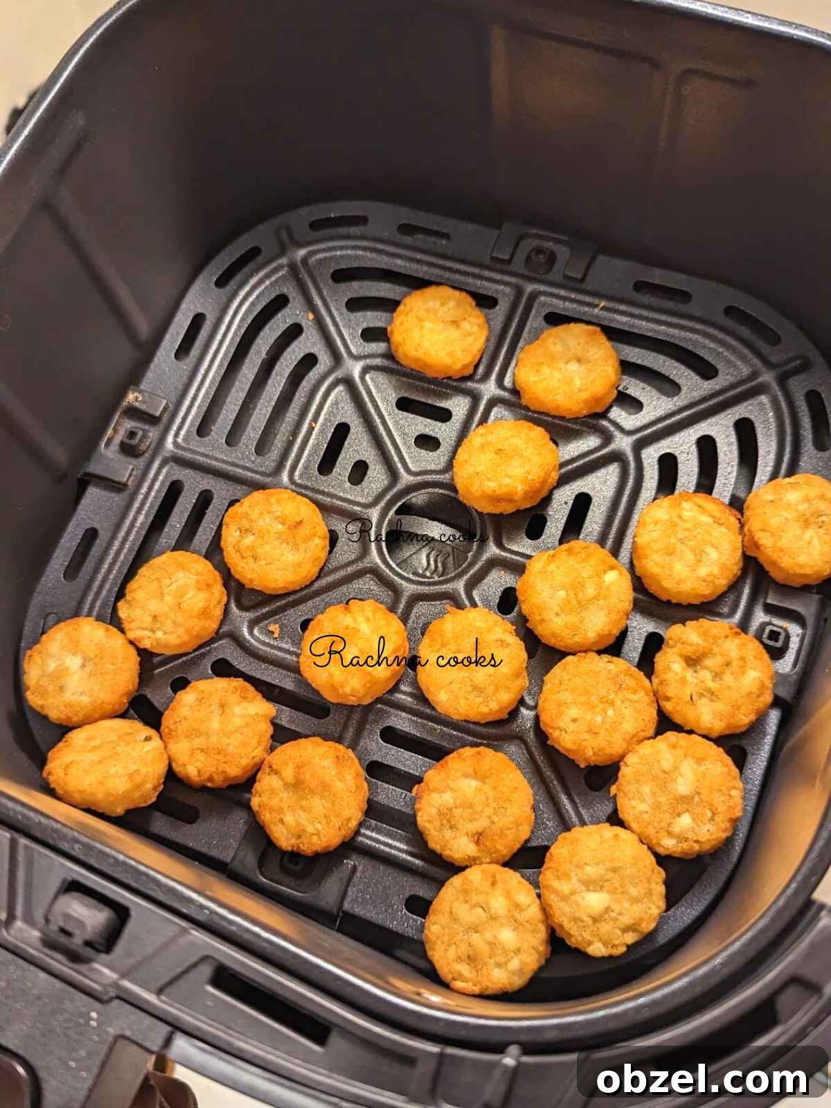 Air Fryer Ore-Ida Crispy Crowns Recipe 7 Crispy Ore Ida crispy crowns in air fryer basket