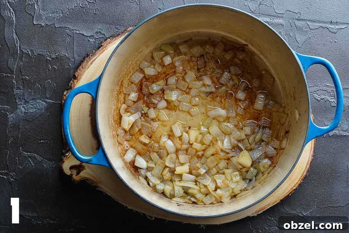 Velvety Carrot, Pumpkin and Apple Soup Recipe 4 Browned Onions in Blue Soup Pot