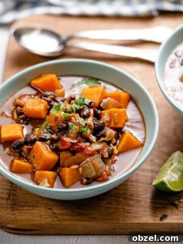 Velvety Carrot, Pumpkin and Apple Soup Recipe 10 sweet potato black bean soup in bowl on wooden board