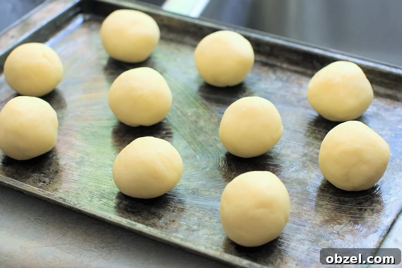 Pan de Yuca Warm Colombian Cheese Bread Rolls 5 the dough is rolled into balls and ready for the oven