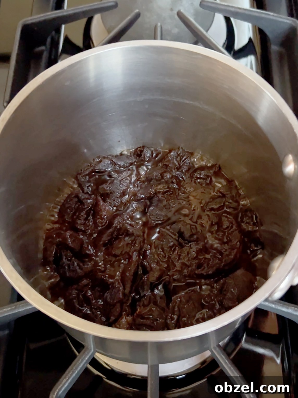 How to Make Lekvar Prune Butter at Home 6 Prunes in a pot after most of the water has cooked away.