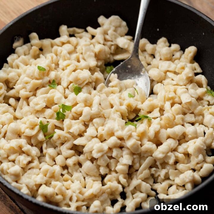Gluten-free spätzle made easy! Soft, tender Austrian noodles for Käsespätzle, buttered sides, or cozy meals with rich stews.