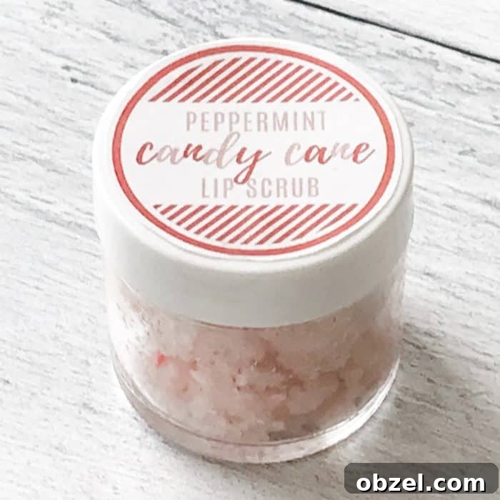 DIY Peppermint Candy Cane Lip Scrub for Soft Lips 12 peppermint candy cane lip scrub with essential oils in glass jar closed with lid and custom label