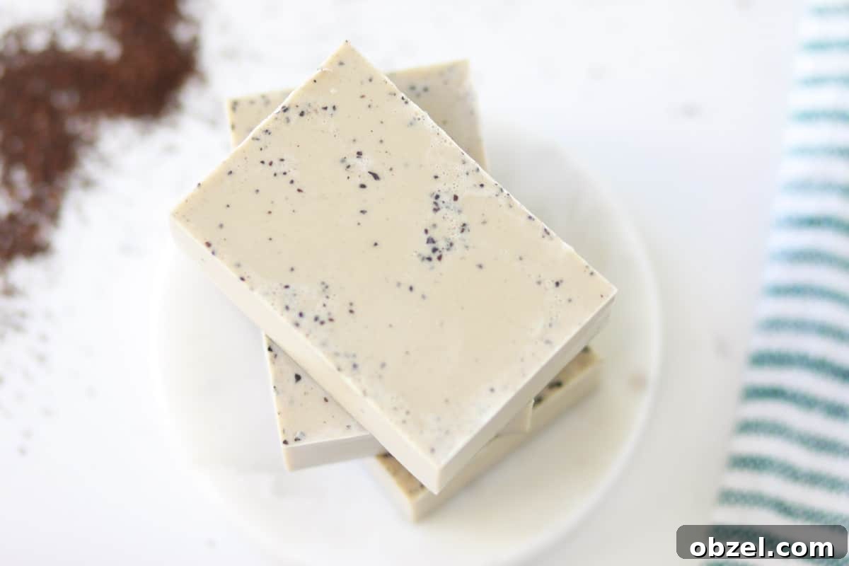 coffee melt and pour soap with ground coffee grounds scattered around