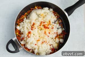 Pineapple Shrimp Fried Rice Recipe 19 Cooked rice added to the skillet.