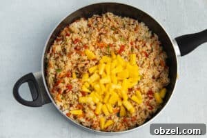 Pineapple Shrimp Fried Rice Recipe 20 Soy sauce and pineapple added to fried rice.