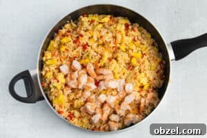 Pineapple Shrimp Fried Rice Recipe 22 Shrimp mixed back into pineapple fried rice.