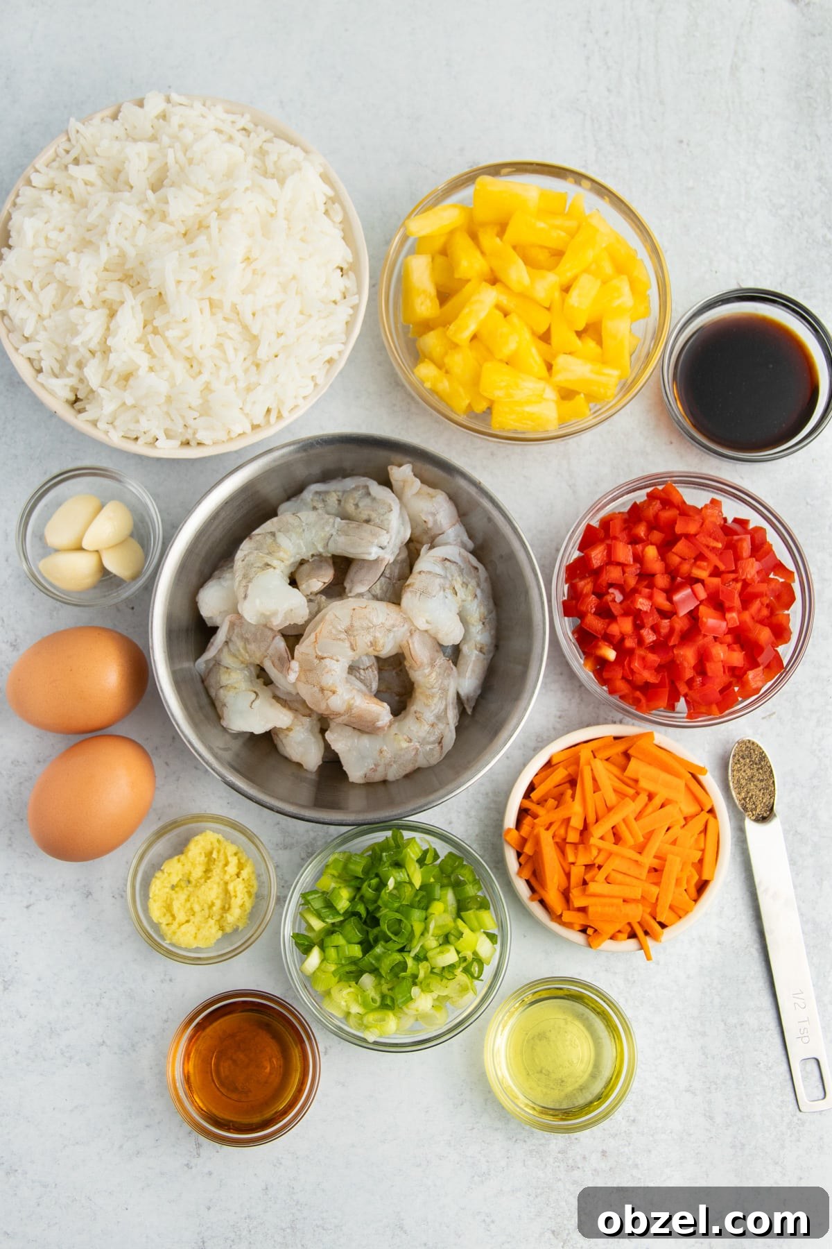 Pineapple Shrimp Fried Rice Recipe 4 Ingredients arranged in bowls for shrimp pineapple fried rice.