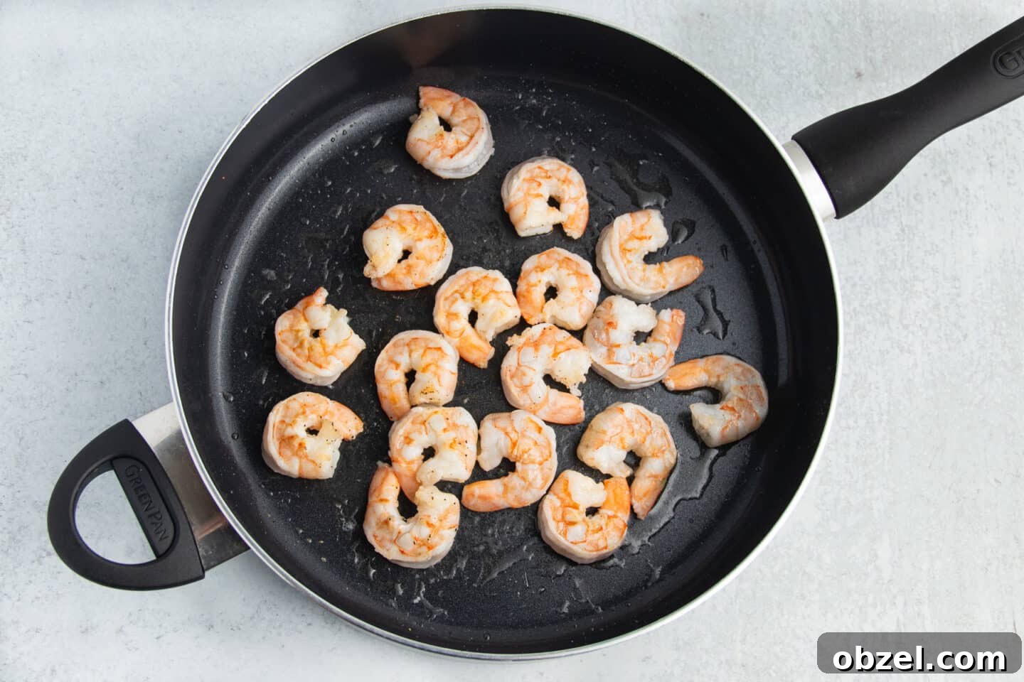 Pineapple Shrimp Fried Rice Recipe 5 Shrimp cooking in a skillet.