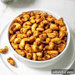 Bowl of roasted curried cashews.