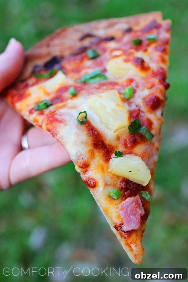 BBQ Ham and Pineapple Pizza with Tangy Sauce 4 BBQ Ham and Pineapple Pizza – Pop in this easy, cheesy ham and pineapple pizza with barbecue sauce for a quick weeknight dinner!