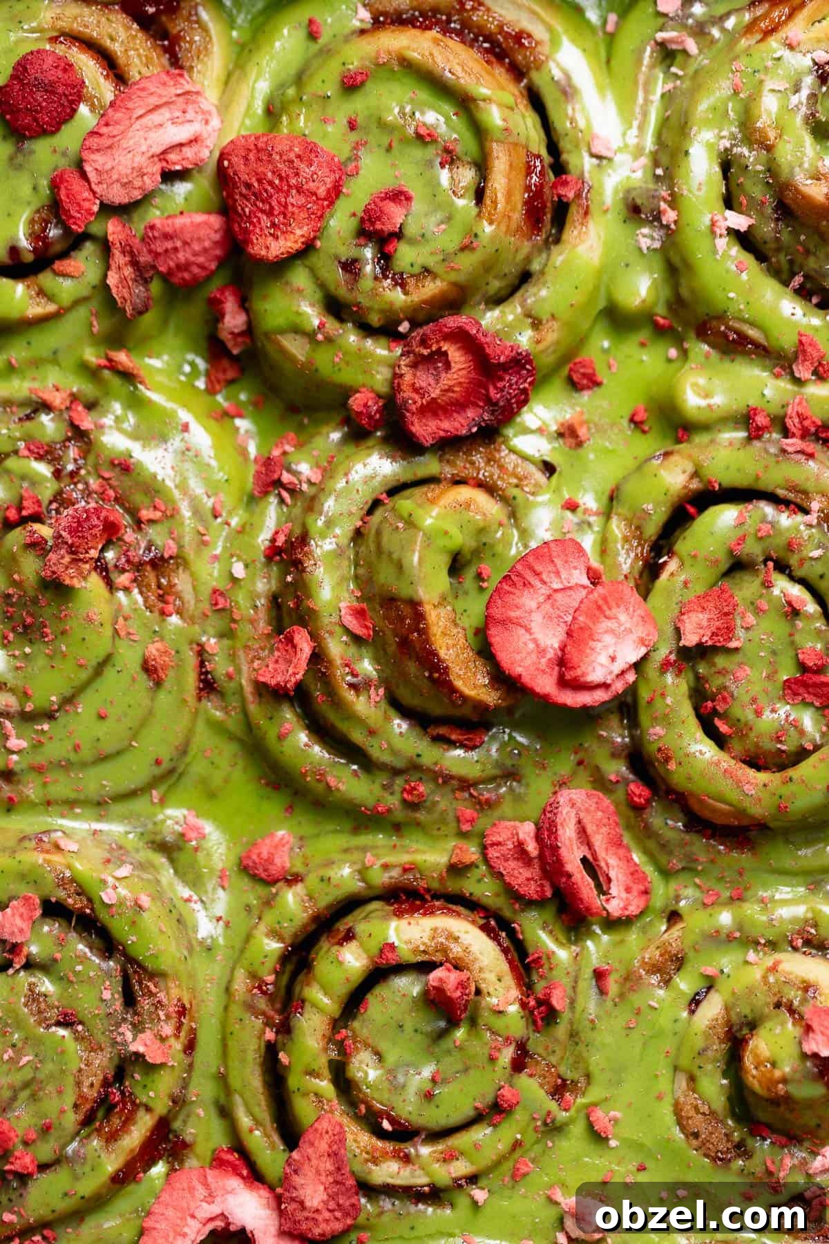 Strawberry Matcha Cinnamon Rolls Recipe 13 Matcha cinnamon rolls with strawberry filling and freeze dried strawberries on top.