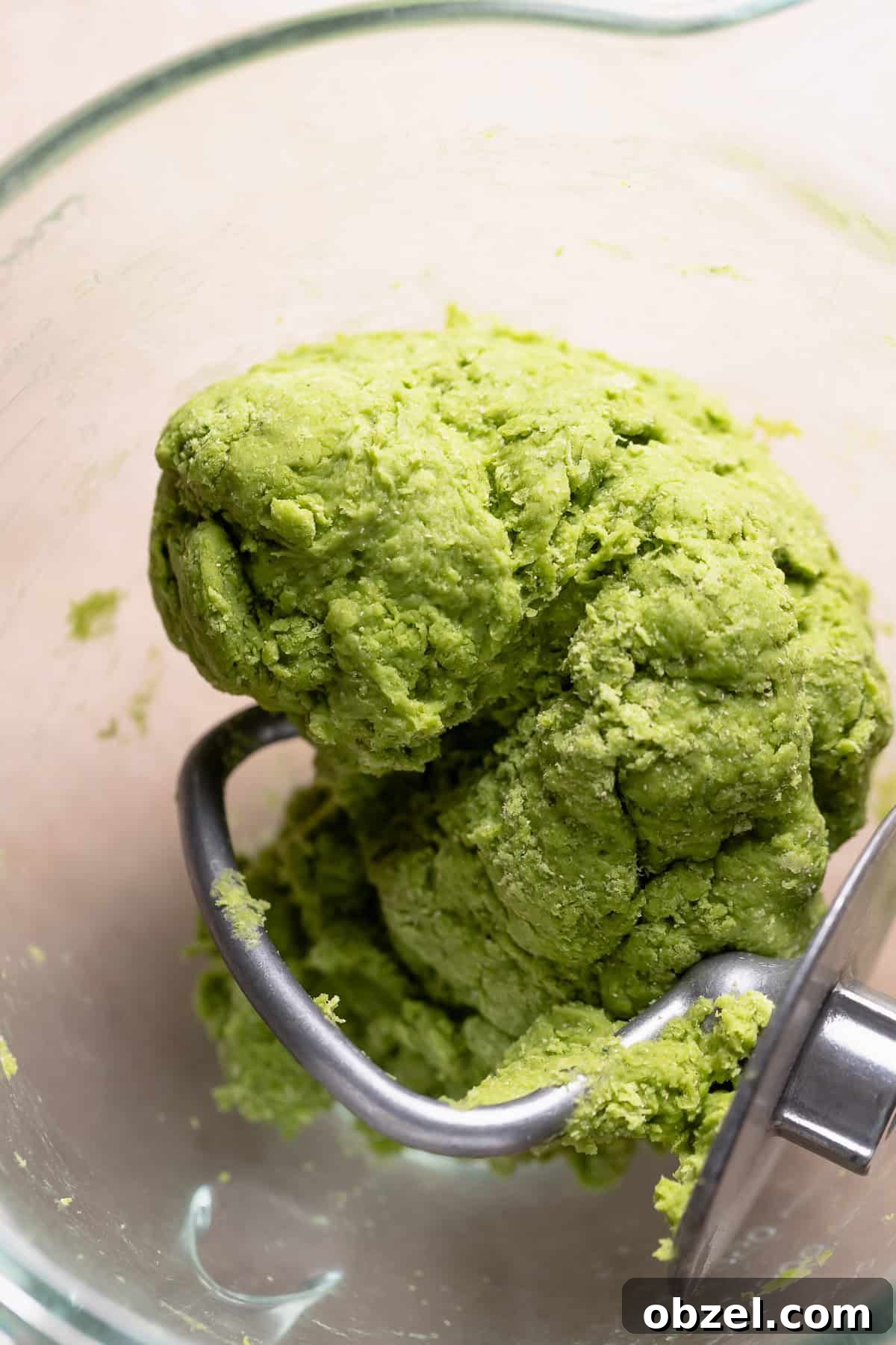 Strawberry Matcha Cinnamon Rolls Recipe 5 Matcha dough ball in a mixing bowl before kneading in the butter.