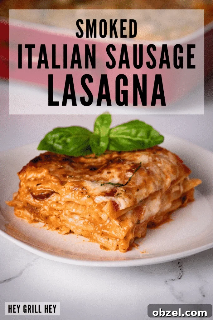 Smoked Italian Sausage Lasagna Recipe 2 One slice of smoked Italian sausage lasagna on a white plate.