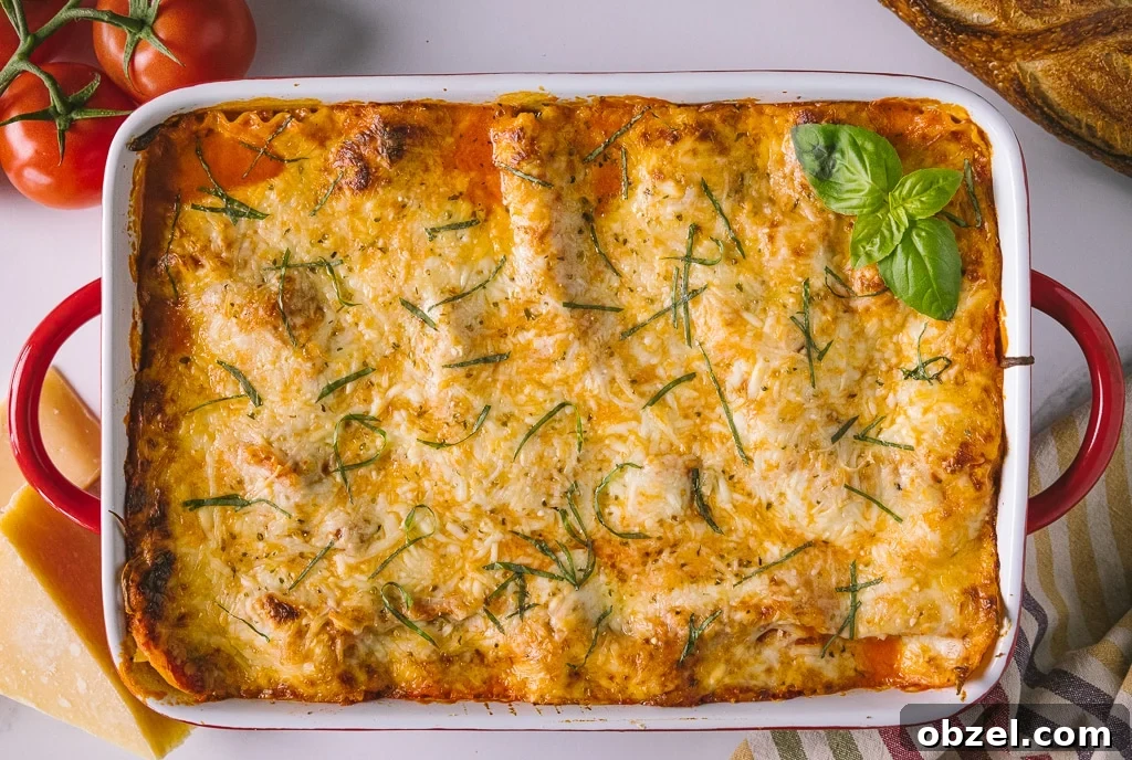 Smoked Italian Sausage Lasagna Recipe 5 overhead shot of a rectangular pan of smoked Italian sausage lasagna.