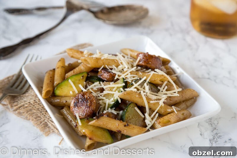Balsamic Pasta with Cherry Tomatoes and Basil 3 balsamic pasta with chicken sausage and veggies on a plate
