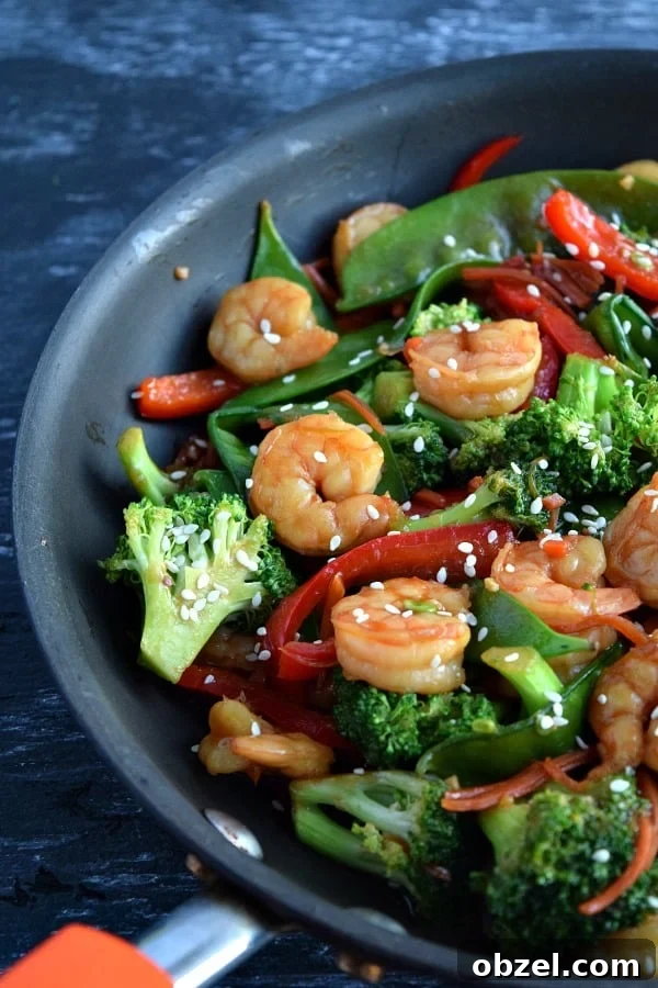 Top New Recipes on The Schmidty Wife in 2018 4 skillet filled with cooked shrimp stir fry