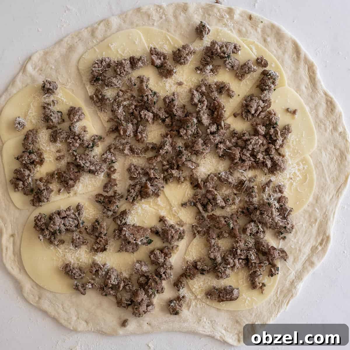 Italian Sausage Bread with Mozzarella 6 Dough topped with ground sausage
