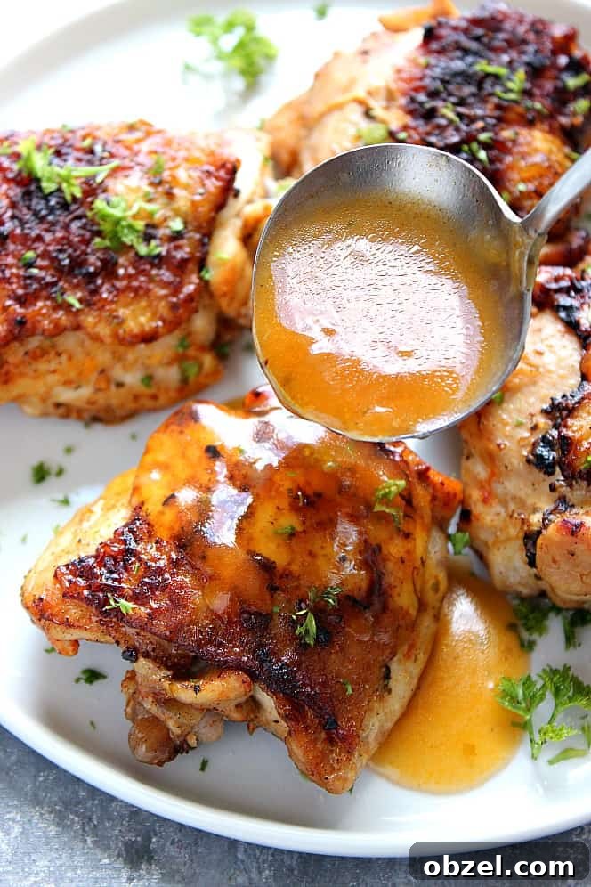 14-Day Instant Pot Meal Plan with Recipes and Grocery List 14 Instant Pot Chicken Thighs poured with gravy.